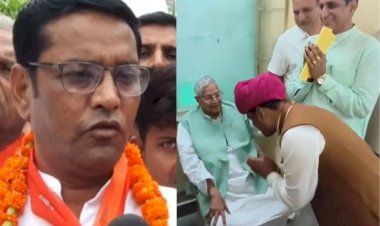 नामांकन भरने से पहले BJP प्रत्याशी ने छुए निर्दलीय प्रत्याशी कैलाश मेघवाल के पैर